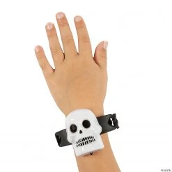 Skull Light-Up Bracelets - 12 Pc. 5 Skull Light-Up Bracelets - 12 Pc. -Cheap Halloween decorations Store skull light up bracelets 12 pc 13981318 a01